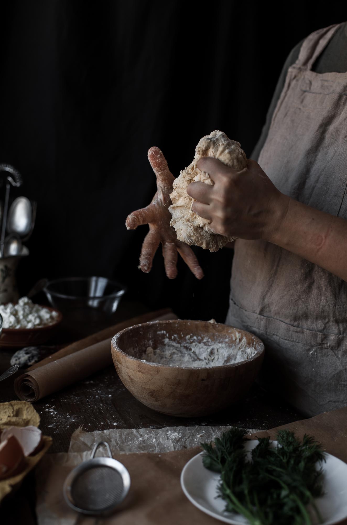 Hands kneading dough